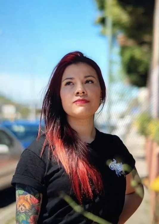 Gina Vargas outside her tattoo studio