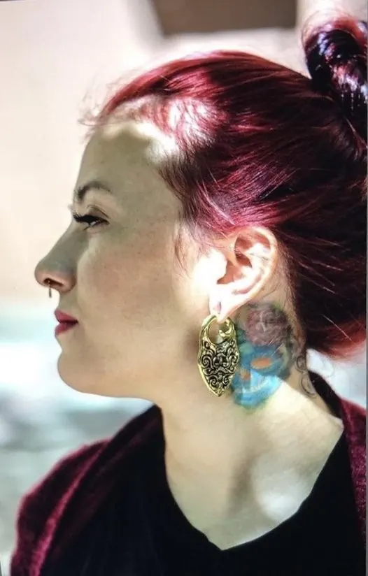 Portrait of tattoo artist Gina Vargas